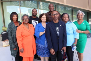 Professor Janis McDonald (blue suit) Stands with families affected by racially-motivated killings who continue to demand justice